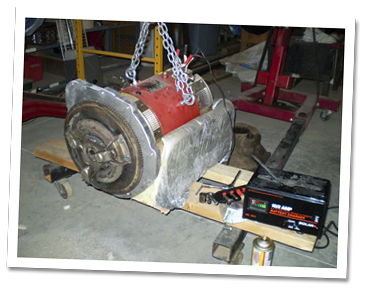 The motor with adaptor plate and flywheel in place motor with adaptor plate and flywheel in place