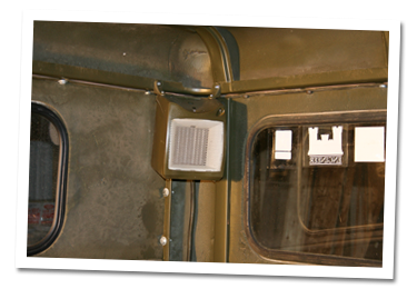 Heater mounted in rear corner of winter cab Heater mounted in rear corner of winter cab