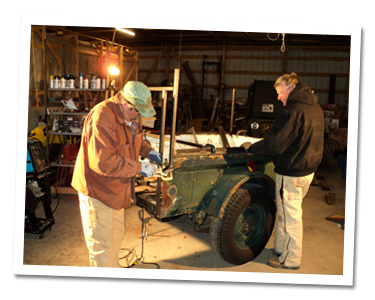 Mike and Greg attaching frame pieces Mike and Greg attaching frame pieces