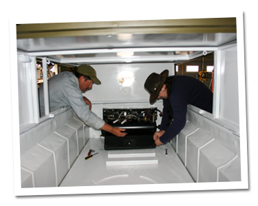 Mike and Steve bolting down air compressor Mike and Steve bolting down air compressor